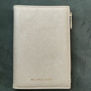 Michael Kors passport and credit card holder. Champagne color / gold hardware.